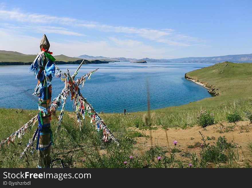 Lake Baikal, Beautiful Blue Water And Sky And Totems