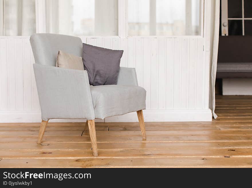 Comfortable gray armchair in room