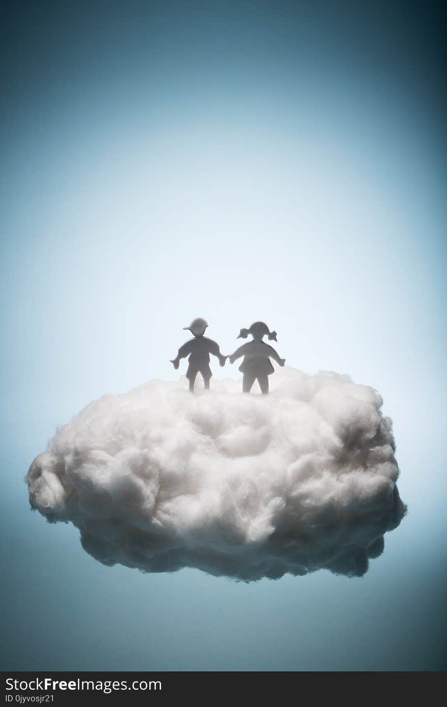 Two children standing on a white cloud. Eternal life. Christianity. Salvation concept.