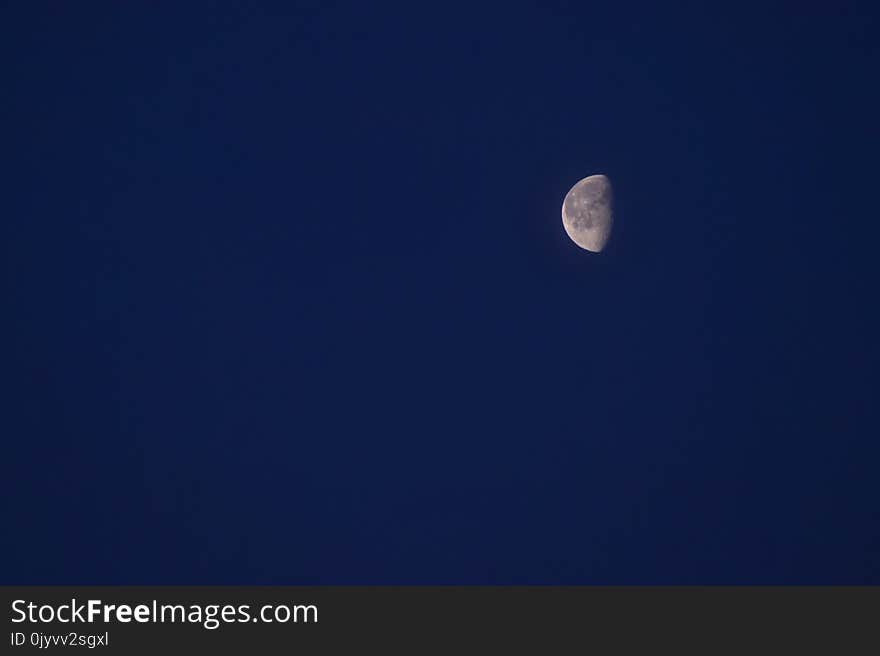 Half Moon Under Clear Blue Sky