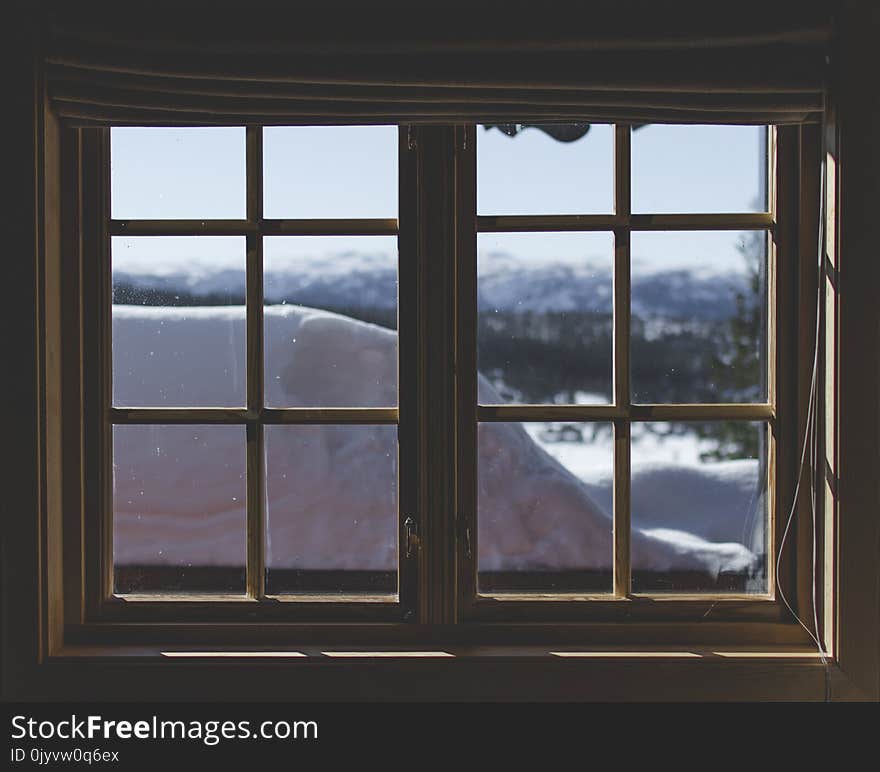 Two Brown Wooden Framed 6-lite Window Panes