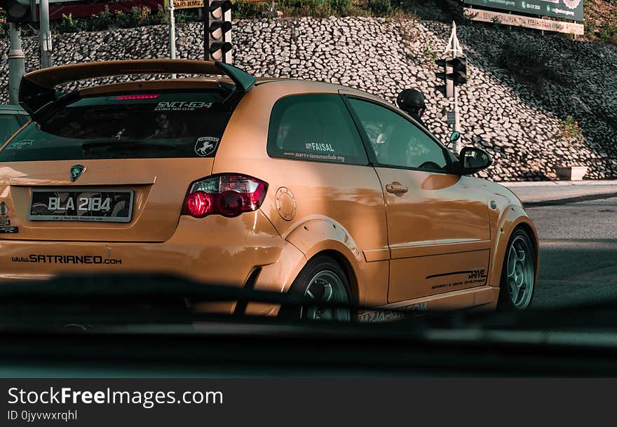 Photo of Orange 3-door Hatchback