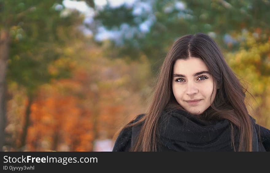 Selective Focus Photo of Woman in Black Top