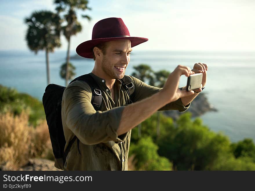 Traveler making photos outdoor