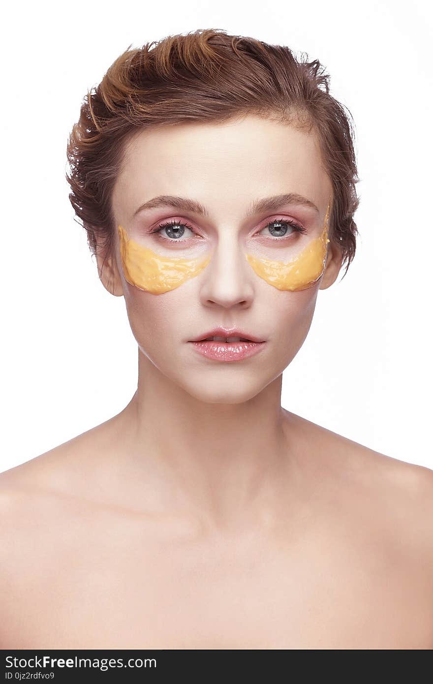 Portrait of a girl with a cosmetic beauty mask on her face