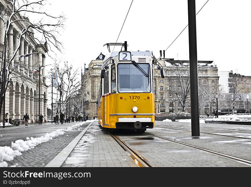 Yellow and White Cable Train