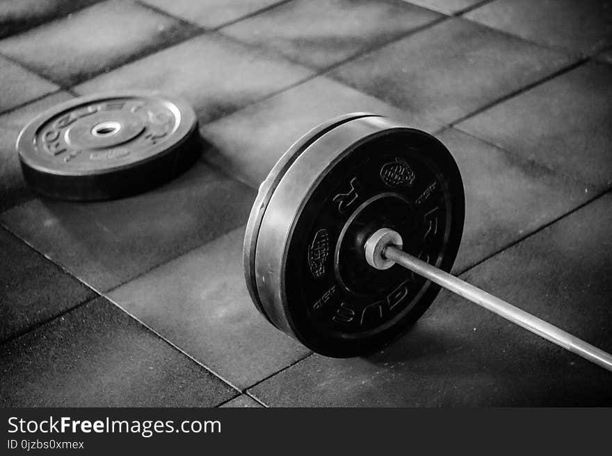 Grayscale Photo of Black Adjustable Dumbbell