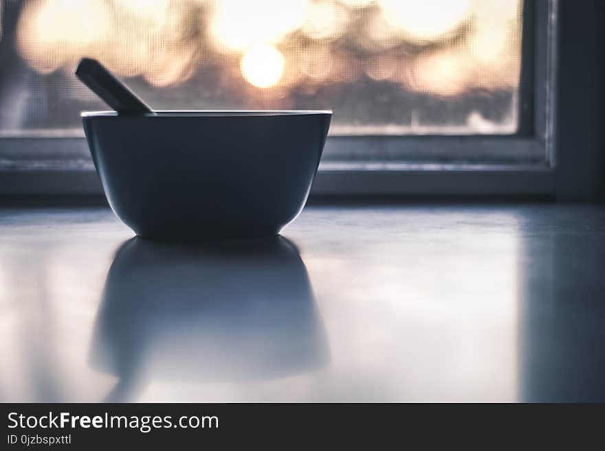 Focused Photography of Blue Ceramic Bowl