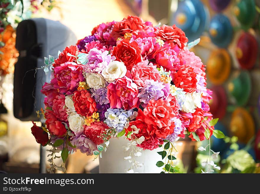 Fake flower and Floral background. rose flowers made of fabric. The fabric flowers bouquet.