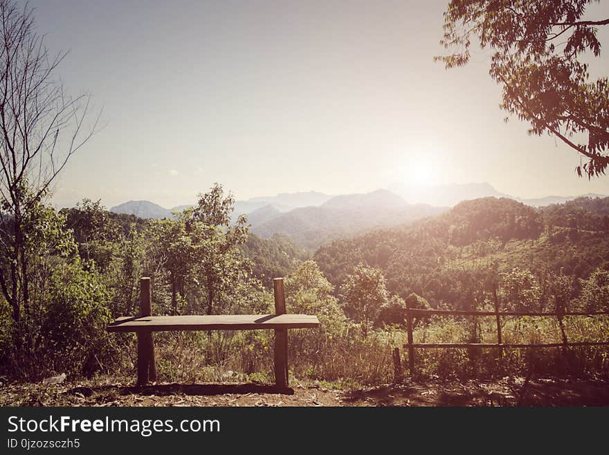 Wooden bench with beautiful mountain view