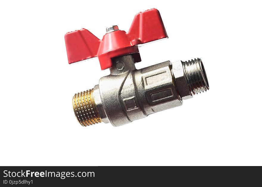 A metal ball valve with a red handle isolated on a white background