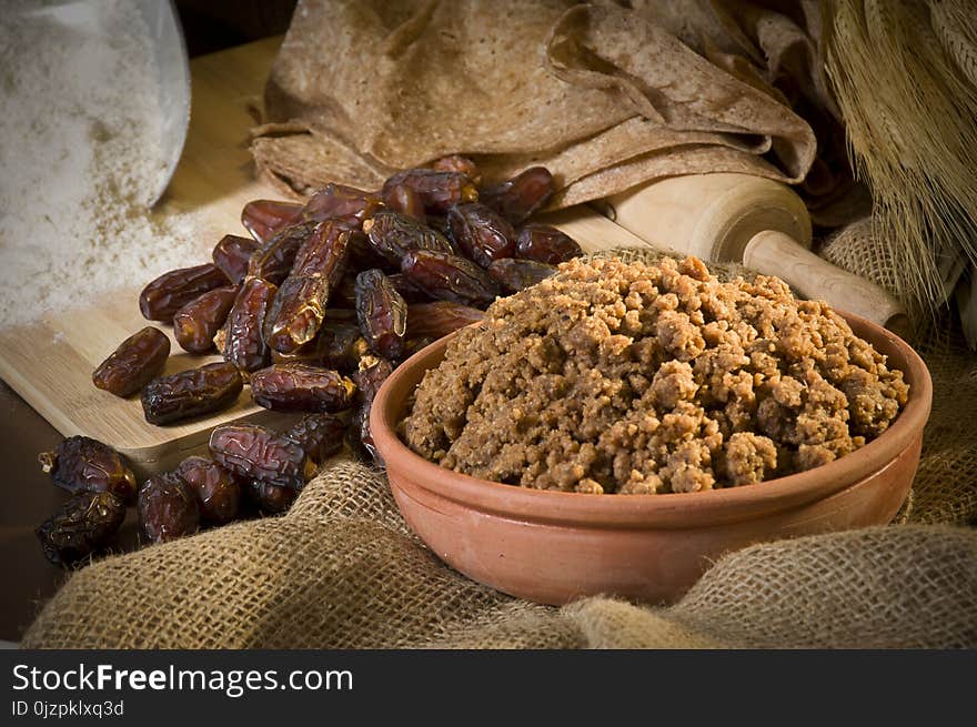 Hunaini, Saudi Arabian Traditional Sweets Made of Dates and Saj Bread Still life with Ingredients