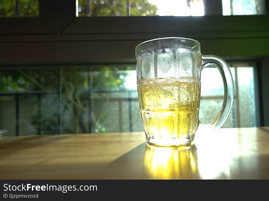 Beer Glass on Wood Table