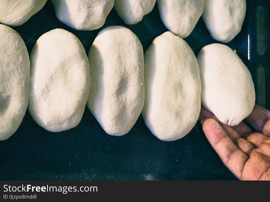 Pies before cooking a woman cooking a meal