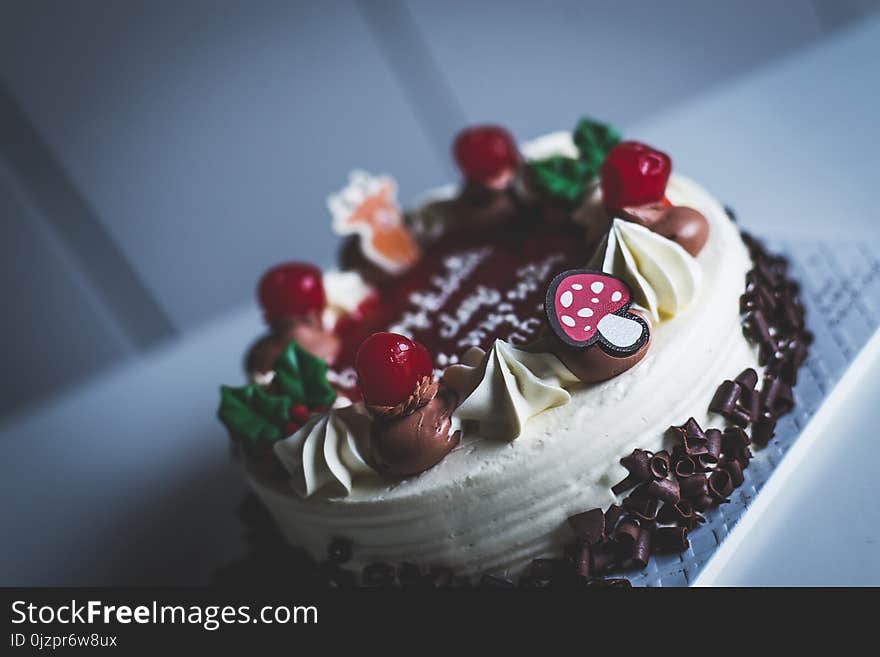 Chocolate and Vanilla cake with topping on table,Close up and selective focus