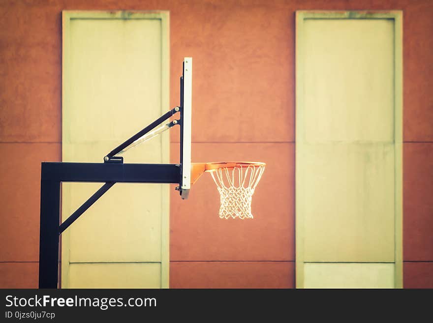 Shallow Focus Photography of Black Metal Outdoor Basketball Hoop