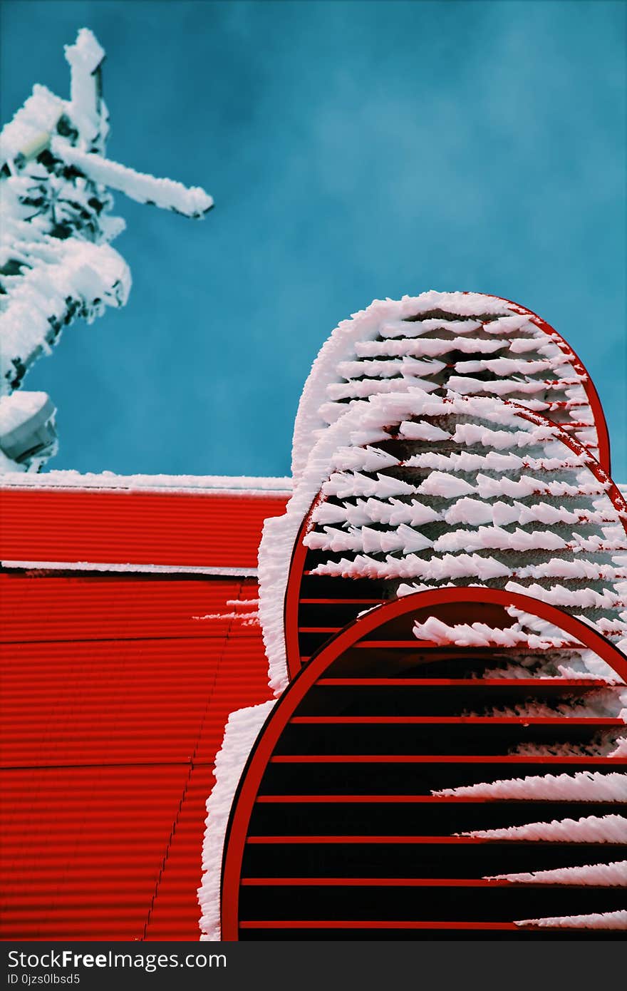 Snows on Red Roof Closeup Photo