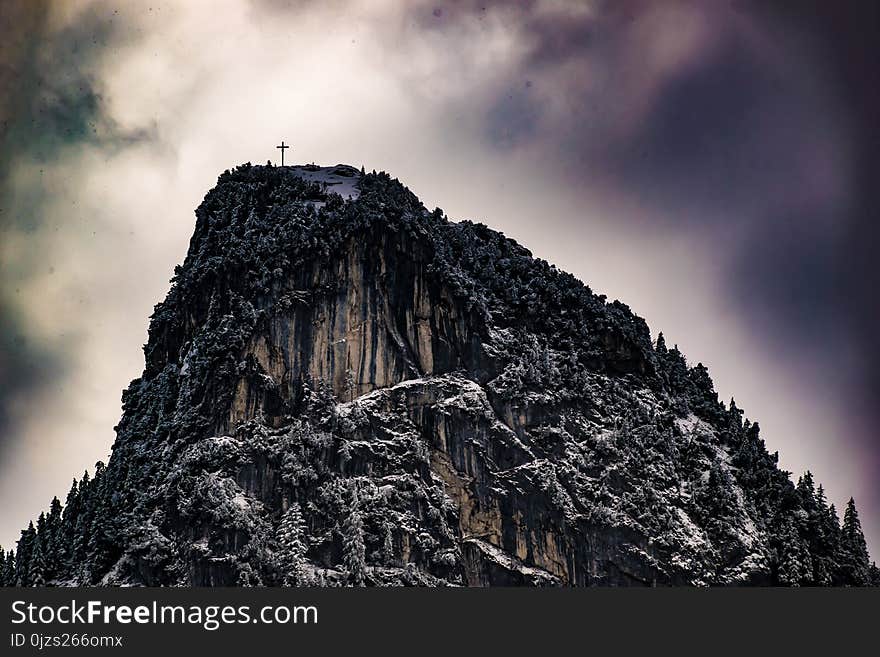 Low Angle Photography of Cross on Top of Mountain