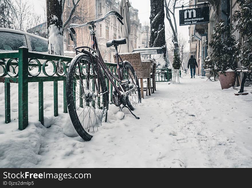 Bicycle on Snow Covered Street