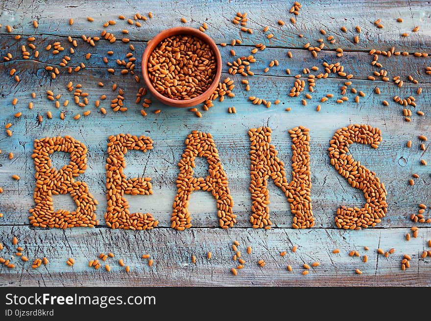 Beans on the table bakground with bowl