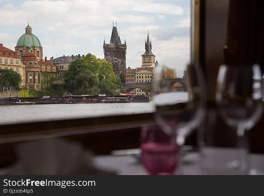 Walk along the Vltava on a river tram. Magnificent Prague, view from the river. A modest dinner on Board