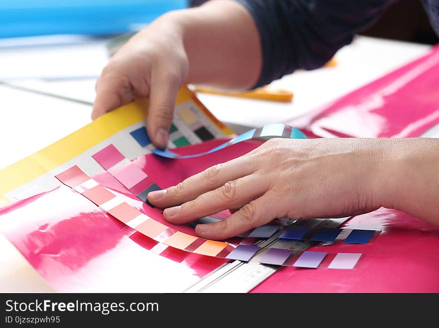 Architect adjusts the color of the paint