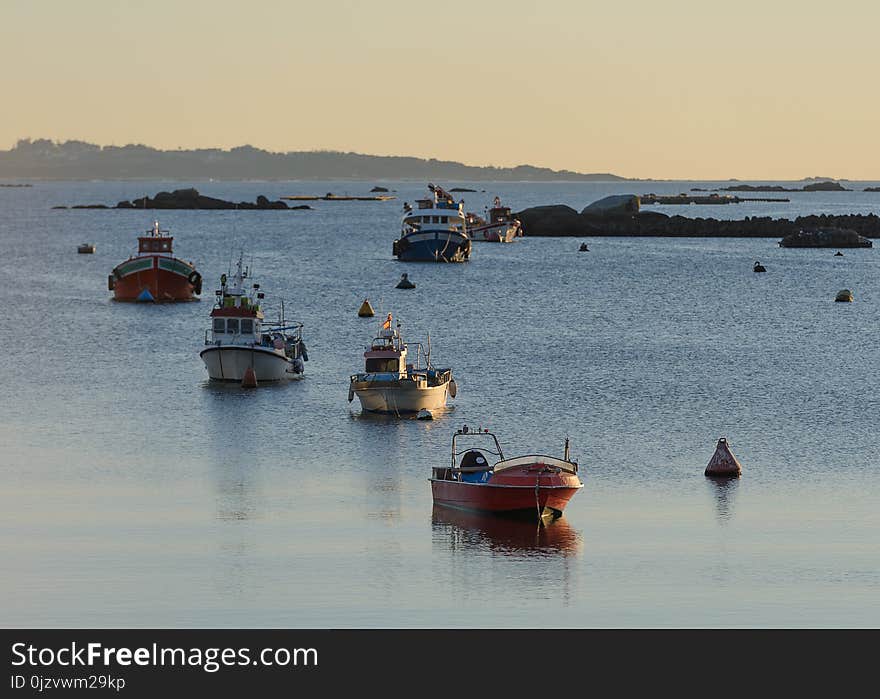 Image of wooden fishing boat moored