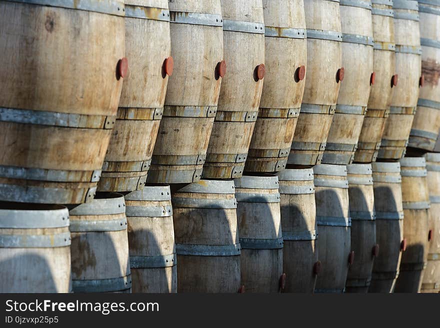 Storage of old barrels in a castle of Bordeaux vineyards, France