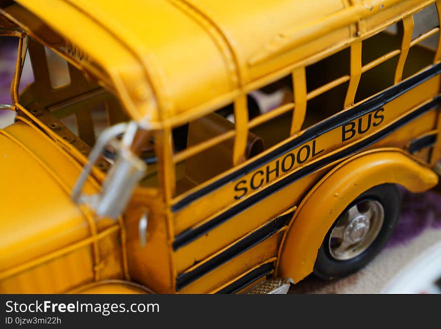 Close Up Miniature Metal Toy Yellow School Bus