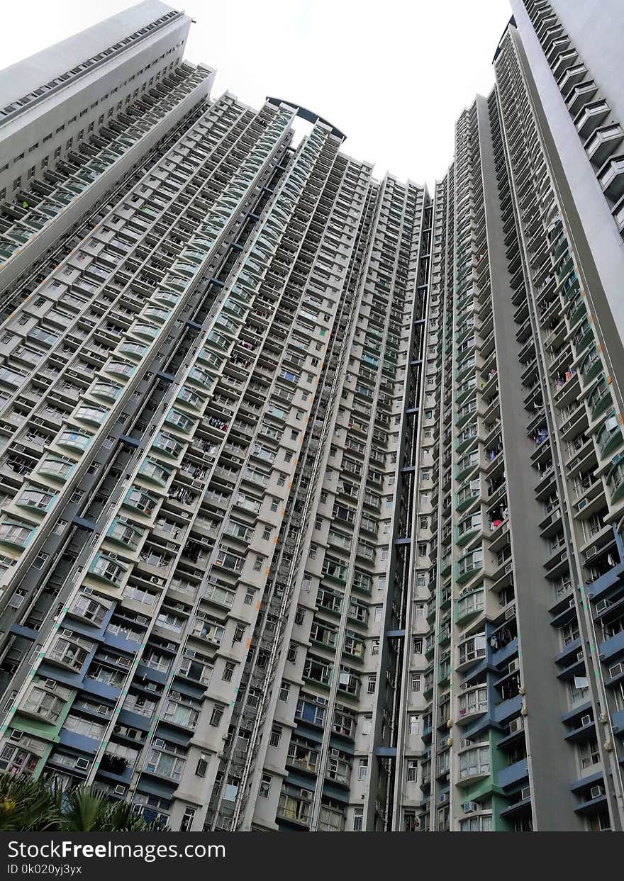 Tall apartment building Hong Kong, china asia. overpopulation in urban city