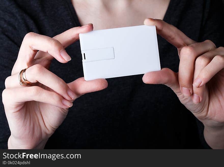 Woman holding white card. mock up design