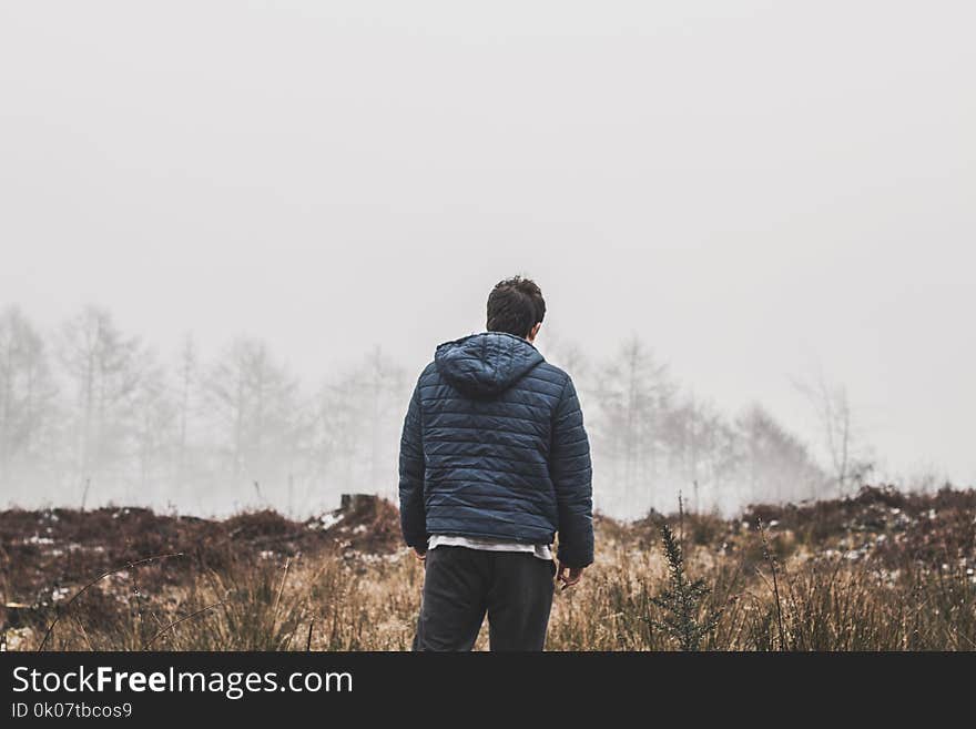 Man Wearing Blue Bubble Hooded Jacket