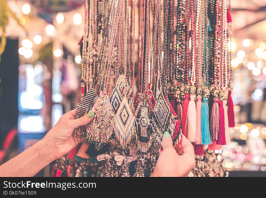 Person Holding Window Tassels