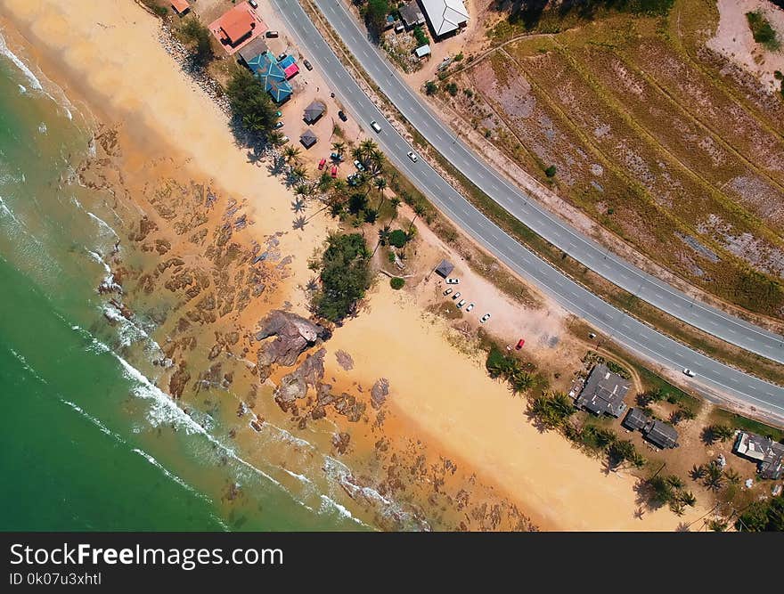 Areal Photography of Seashore Beside Sky Way