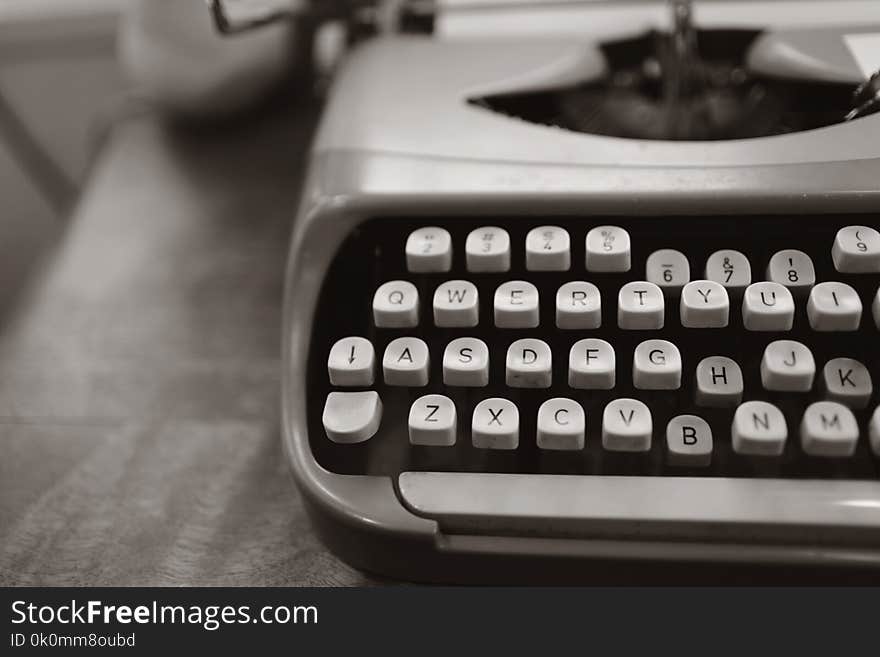 Close-up Photo of Gray Typewriter