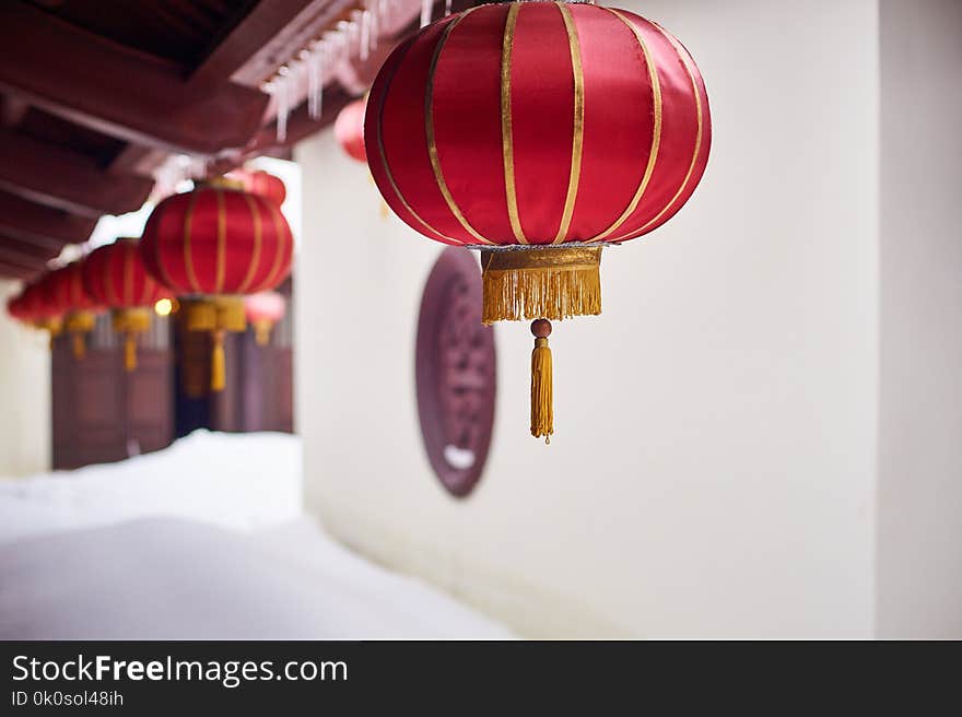 Red lanterns in vietnamese buddhist temple at winter day