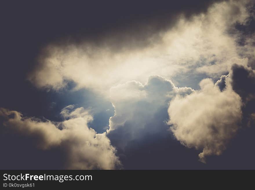 Heavy grey clouds in the sky before the rain filtered. Heavy grey clouds in the sky before the rain filtered.