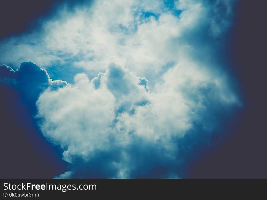 Heavy grey clouds in the sky before the rain filtered. Heavy grey clouds in the sky before the rain filtered.