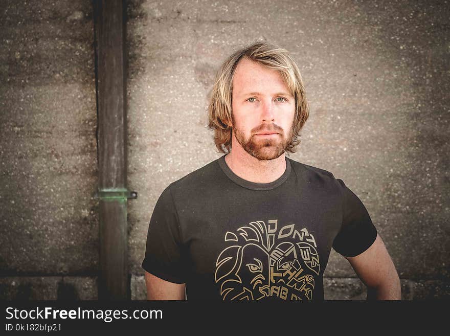 Photography of a Man Wearing Black Shirt