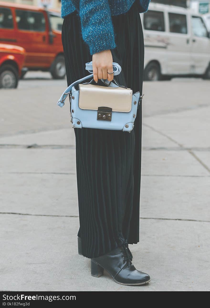 Woman Wearing Blue Leather Purse