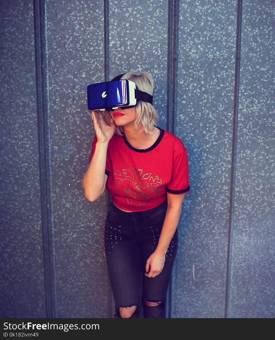 Photo of a Woman Wearing Virtual Reality Headset