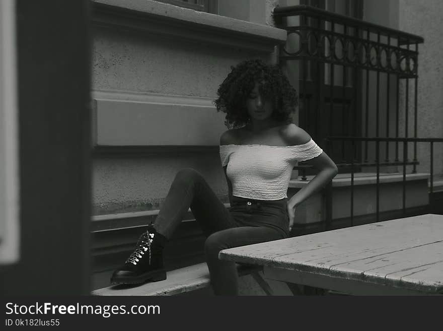 Monochrome Photography of Woman Wearing White Off-shoulder Top