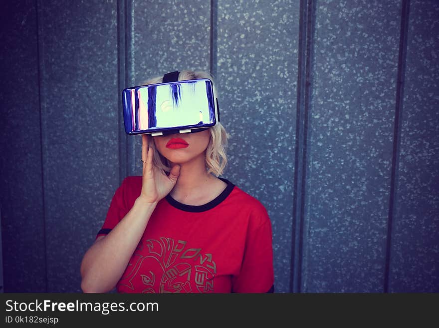 Photography of a Woman Wearing Virtual Reality Headset