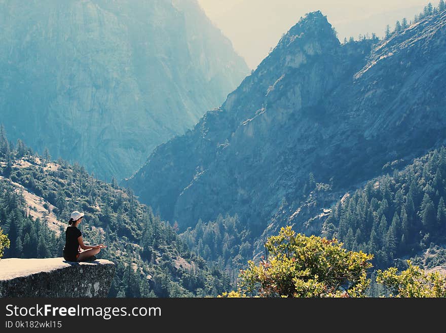 Photography of a Woman Meditating