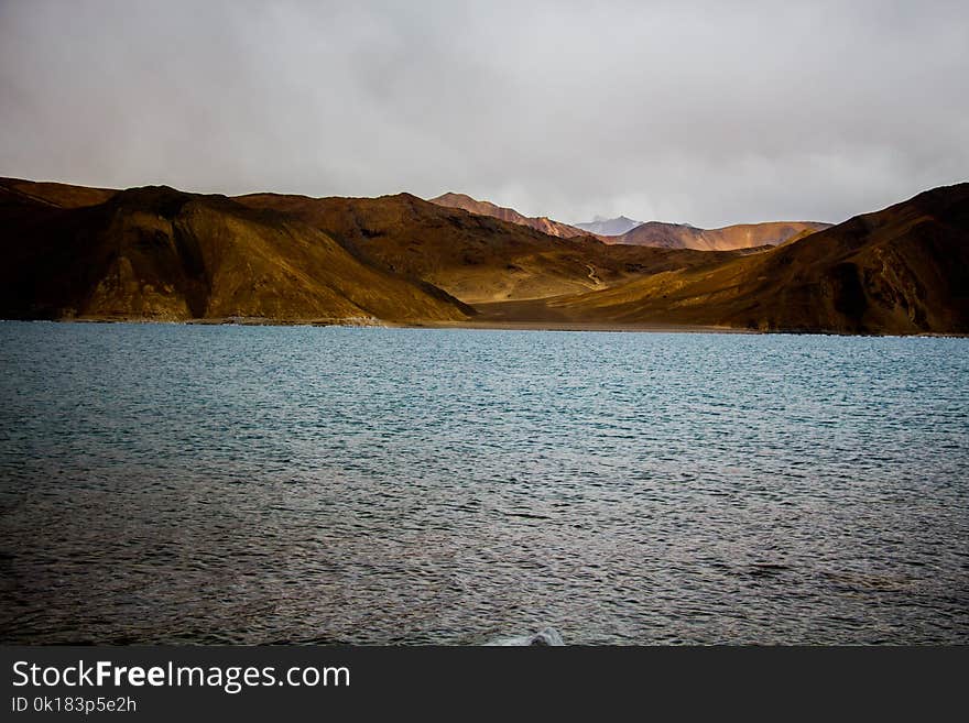 Photo of Mountains Near the Sea