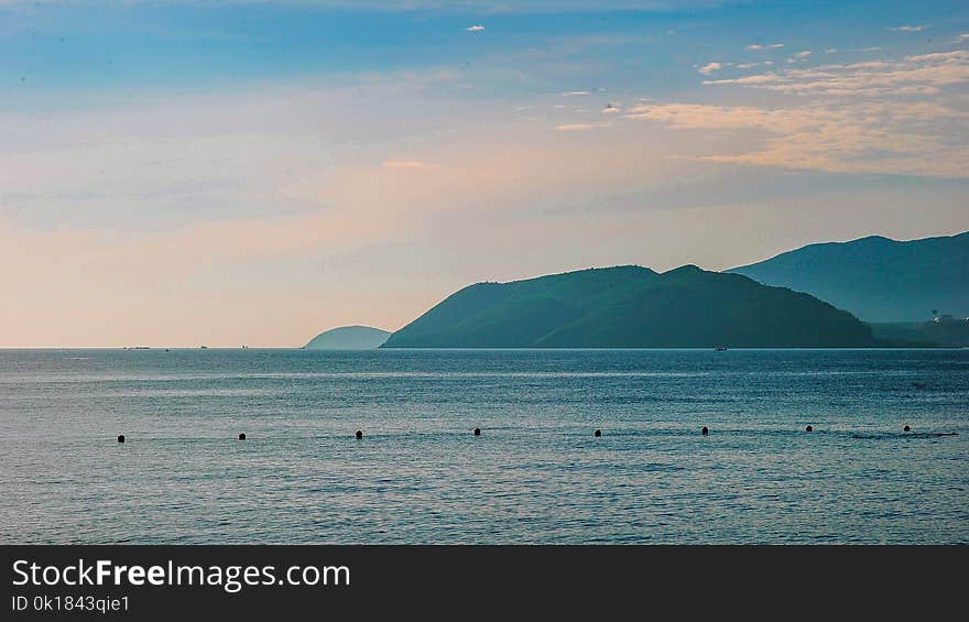 Scenic View of Mountains Near the Ocean