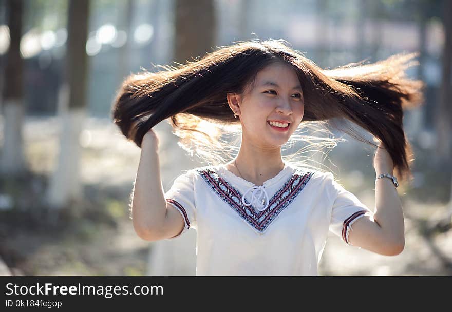 Close-Up Photography of a Smiling Woman