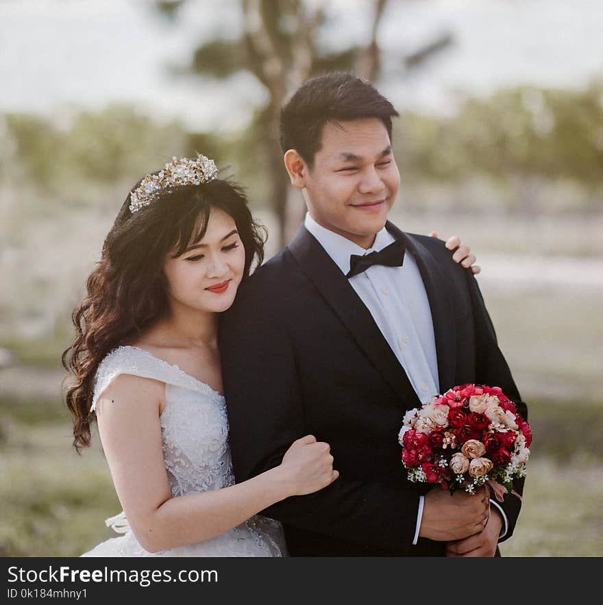 Photography of a Couple Smiling