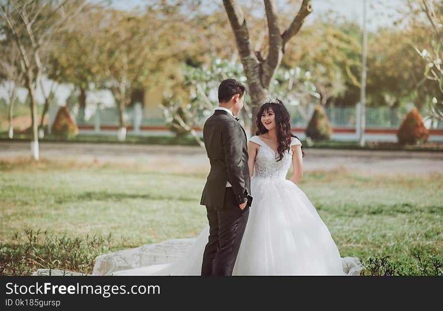 Photo of Bride and Groom Talking