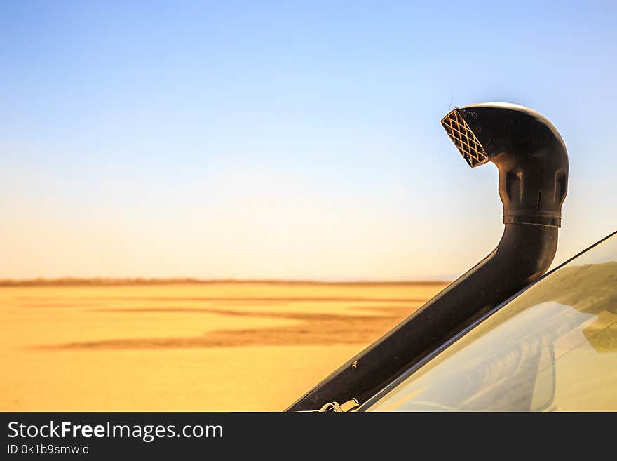 Close up of Exhaust pipe in the desert